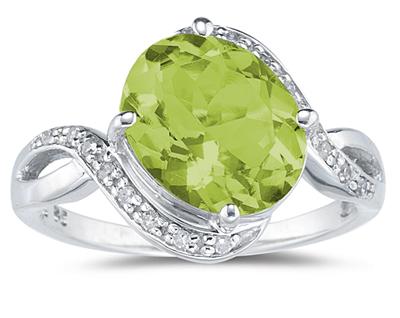 Oval Shaped Peridot and Diamond Curve Ring in 10K White Gold